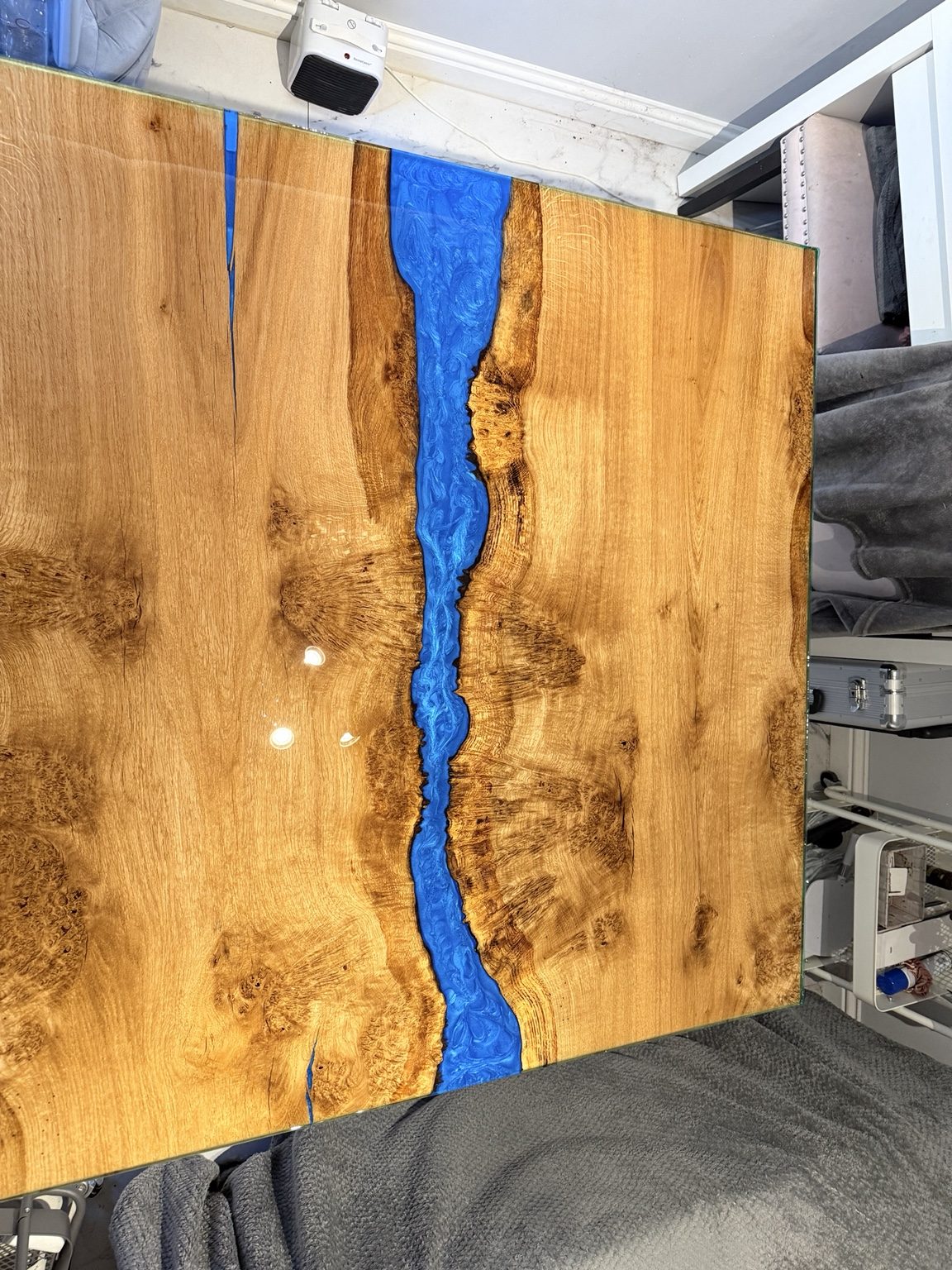 Blue resin river table handcrafted by Knowles Timber Studio